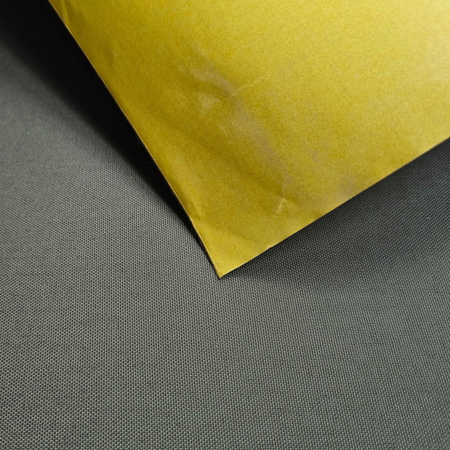 2 Mil Acrylic PSA: 500 Denier CORDURA Truelock™ Fabric (Sold per 1/2 Yard)