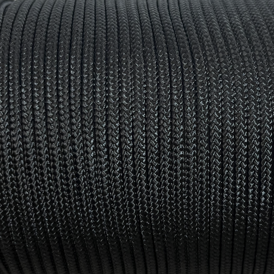 Cordón redondo de nailon negro de 1/8" (se vende por yarda)